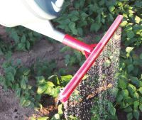 Logo Po�tic pomme d'arrosoir 'arroseur de pelouse', rouge 6461793