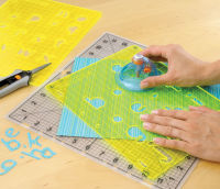 Logo Fiskars cutter motif shapecutter, transparent / orange 60000248